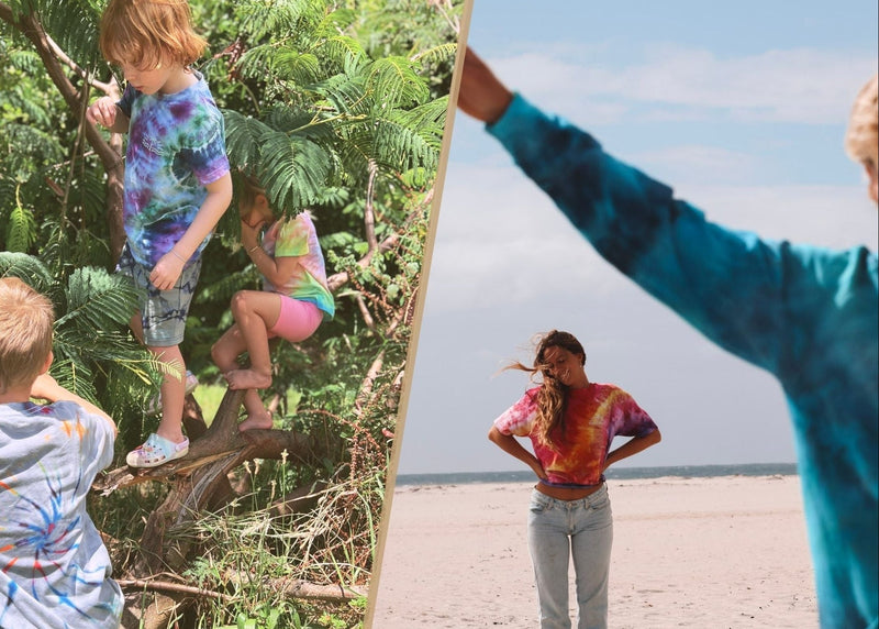 Two children playing in a tree on one side and a woman in tie-dye shirt standing on a beach on the other side.